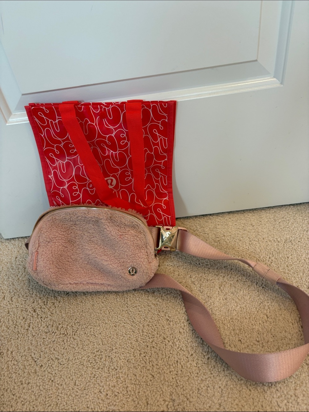 lululemon light pink sherpa logo pouch
